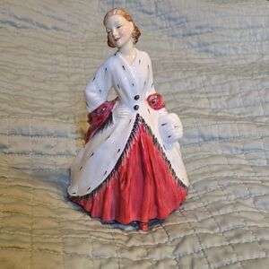 Royal Doulton Vintage "The Epmine Coat" Figurine with White Coat and Red Dress